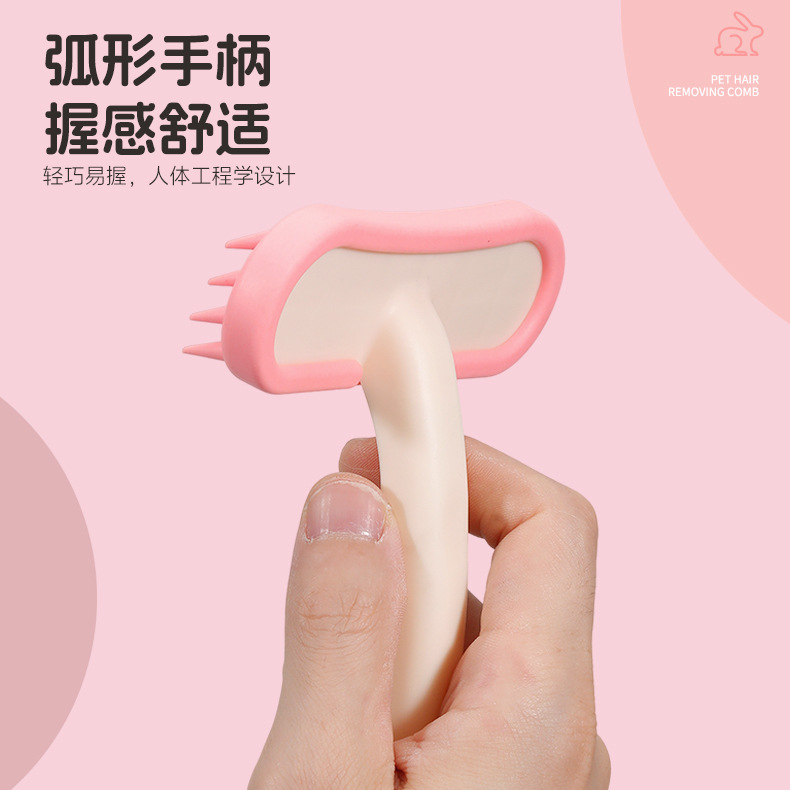 Fábrica al por mayor peine para mascotas perro gato peine de silicona masaje peine de dientes suaves peine de pelo flotante artefacto de depilación de conejo