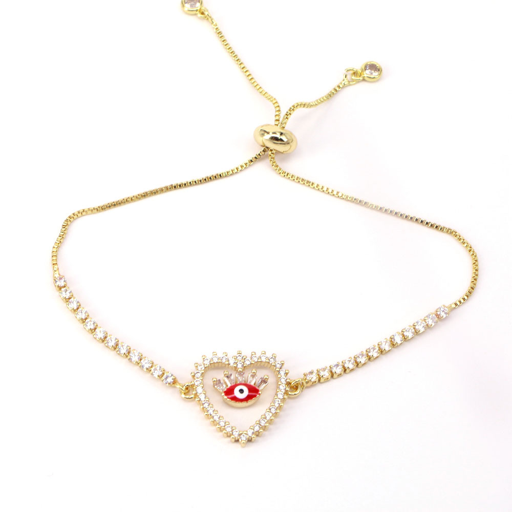 Pulsera De Ojo Malvado De Circonio Con Micro Incrustaciones De Oro 18k De Cobre En Forma De Corazón De Moda display picture 5