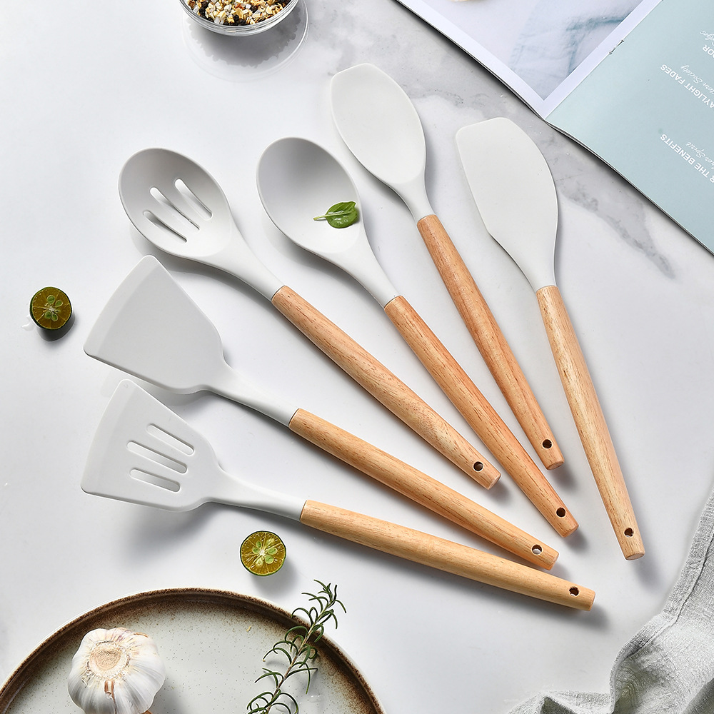 Utensilios de cocina de silicona transfronterizos con traje de mango de madera Cuchara de cocina de 34 piezas pala Traje de 34 piezas utensilio de cocina