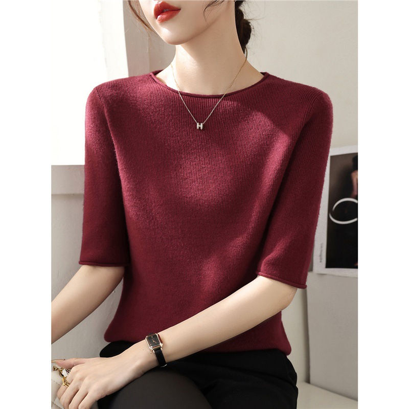 Demi-season woolen design knitted sweater with a round collar