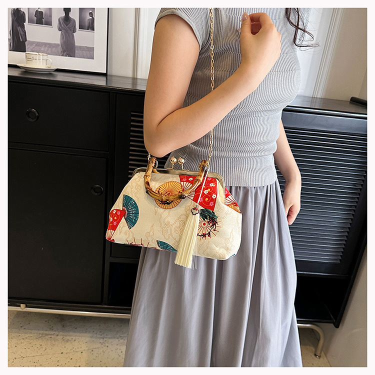 2023 neue grenzüberschreitende Nischenclip-Schnalle, High-End-Dinner im ethnischen Stil, Modekette, eine Schulter, Umhängetasche für Damen_voghion.com