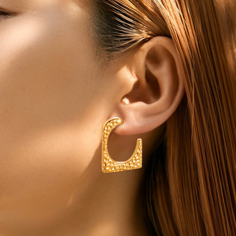 Pendientes hidráulicas de mujer retro de acero inoxidable transfronterizo de alta calidad de fábrica de pendientes de joyería de acero de titanio europeo y americano venta al por mayor