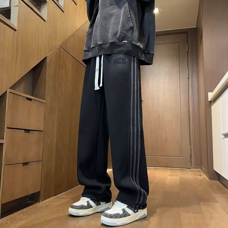 中学生向けの春と秋のパンツ、ハンサムなカジュアルパンツ、ティーンエイジャー向けのルーズストレートパンツ、多用途のスポーツパンツ|undefined