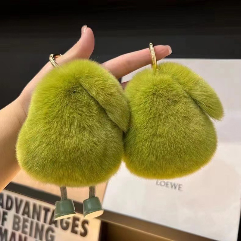 Peludo aguacate llavero de automóvil colgante llavero de automóvil colgante bolso de muñeca de peluche rojo colgante