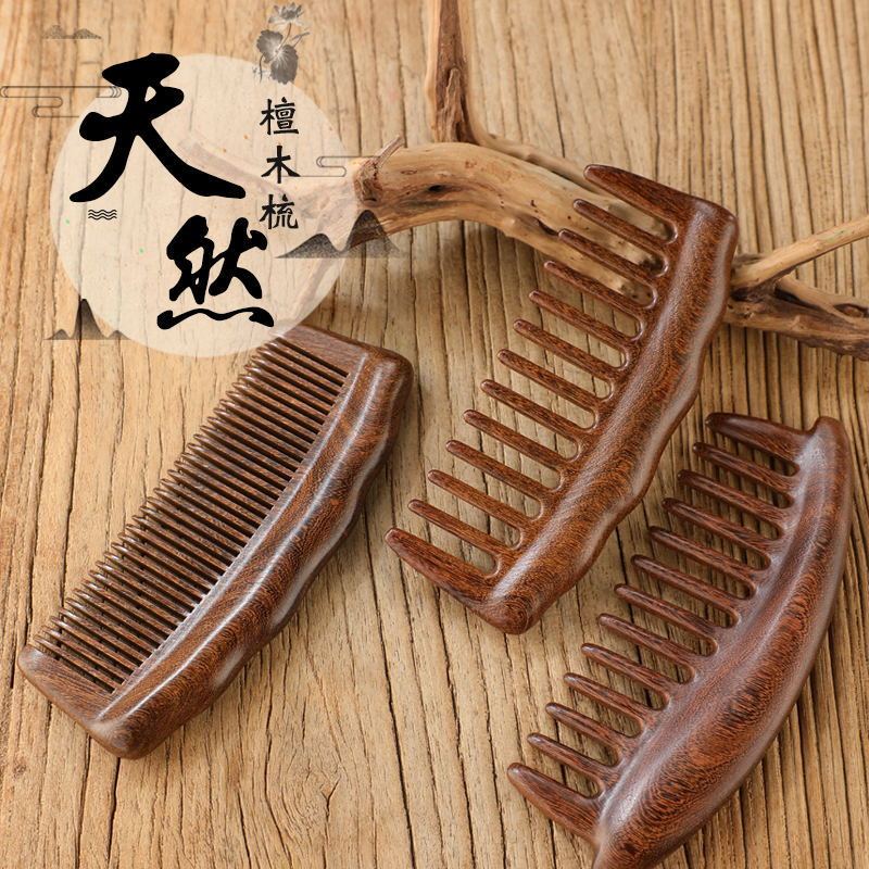 新型の黒金檀木櫛は木を整えて一体を厚くして彫刻します。|undefined