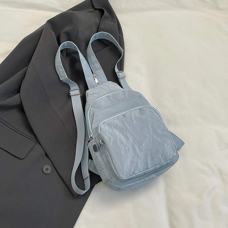 Nuevos productos de cuero suave pu doble uso bolso de pecho de moda de mujer impresión de tendencia nueva mochila china textura mochila pequeña