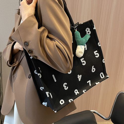 Student portable canvas commuter tote bag  fashionable casual mommy bag female ins versatile shoulder school bag