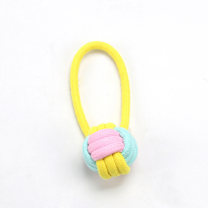 Suministros populares de juguetes para mascotas japoneses y coreanos, juego de juguetes duraderos para perros resistentes a las mordidas, juguete de pelota con nudo de cuerda para cachorros.
