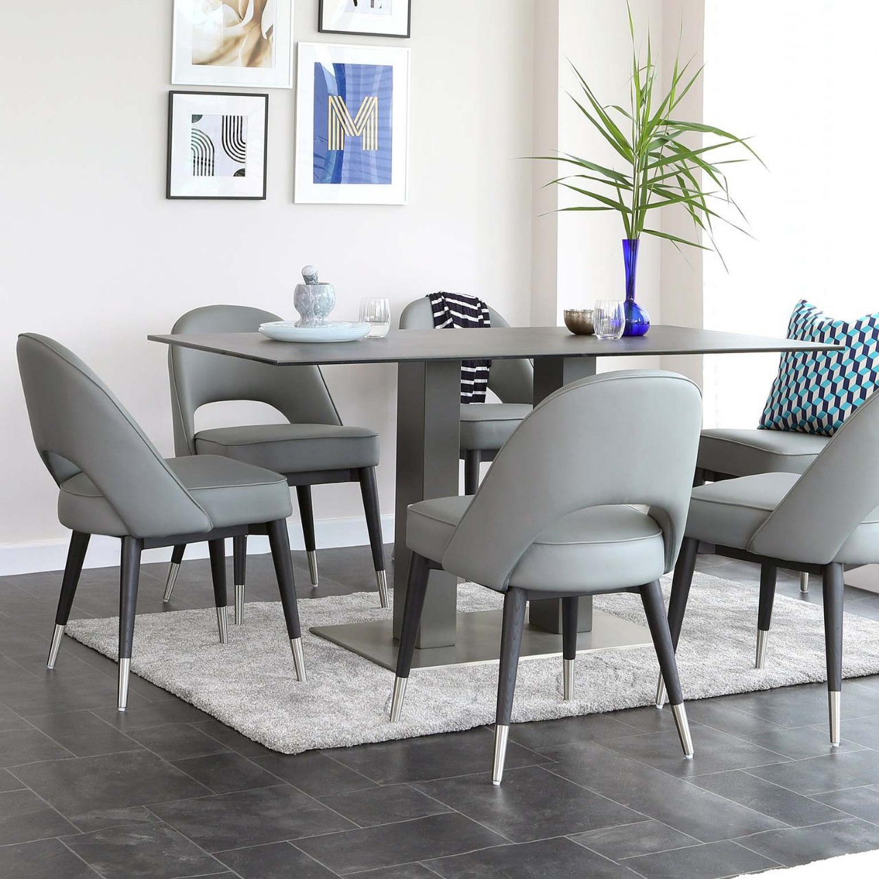 Mesa de comedor de vidrio temperado mesa de comedor de lujo ligera alta sensación mesa de tabla de roca moderna simple mesa de comedor silla