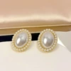 White ear clips from pearl