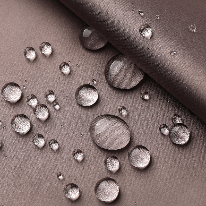 680T緞紋春亞紡緯加捻彈絲仿記憶加密防絨壓光羽絨服滌綸面料