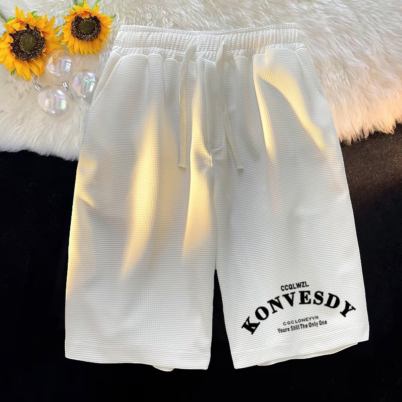 Waffle casual minimalista para hombres, camiseta de manga corta de verano, pantalones cortos para hombres con un conjunto de ropa de moda.