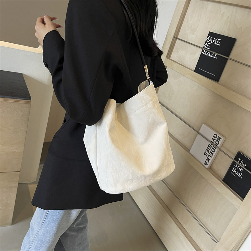 纯色韩版简约单肩包包女2025春夏小众设计百搭ins斜挎包水桶包女|undefined