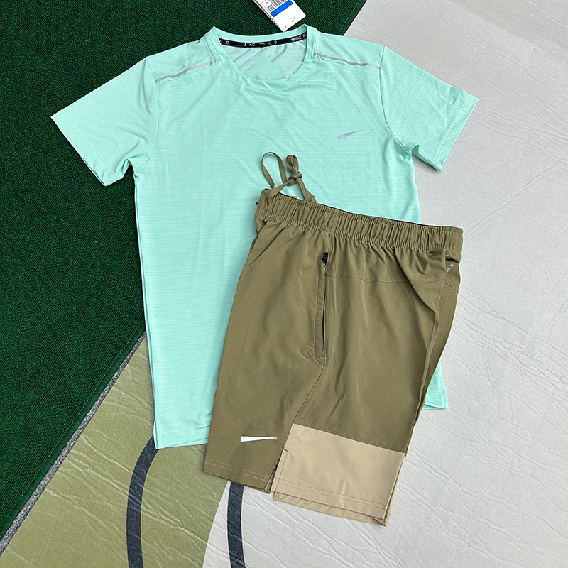 Mayorista nuevo juego de comercio exterior deportivo fitness juego de carrera rápida secado transpirable suelto ocio pantalones cortos de manga corta ropa de hombre