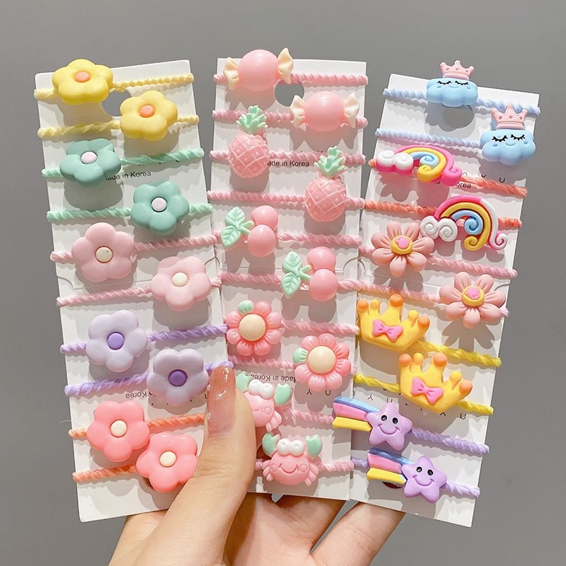 La cuerda del pelo del bebé de las muchachas de la banda de goma de los niños no lastima el pelo Los accesorios del pelo del pulgar del tamaño pequeño atan la banda de goma del pelo