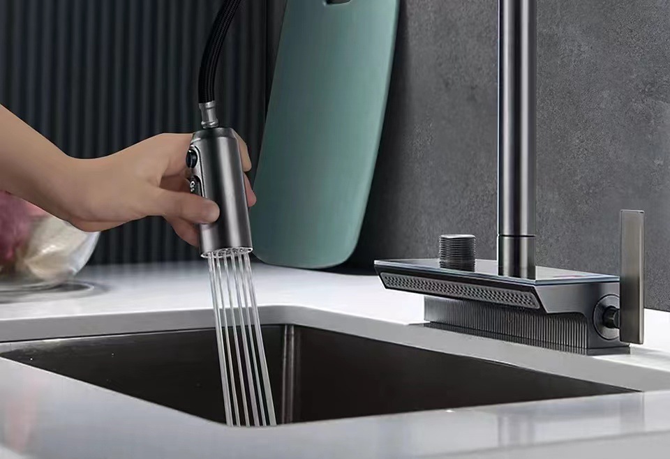 The kitchen is equipped with a universal all-copper digital display hot and cold sink faucet that can be pulled out like a flying rain waterfall undefined
