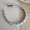 Narrow diagonal blue stripes