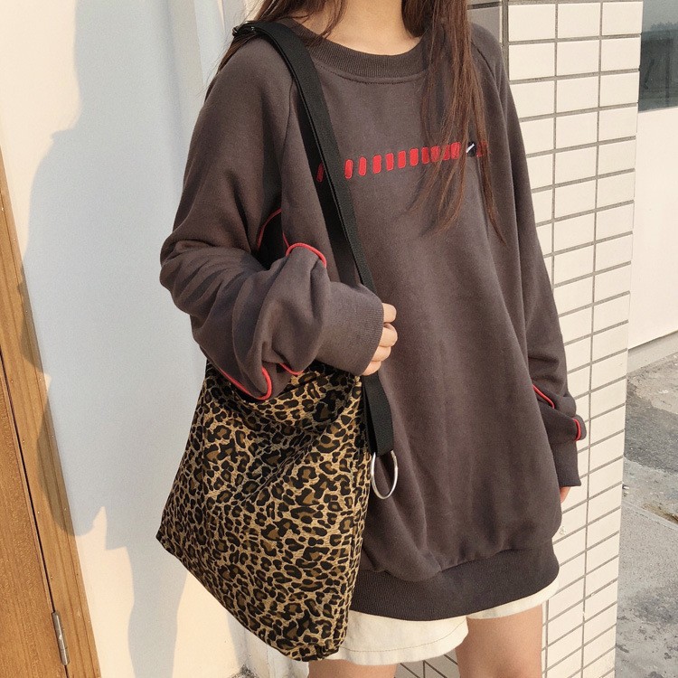 Bolso de lona con estampado de leopardo nuevo todo fósforo Corea del Sur elegante bolso de hombro retro para mujer bolsa de compras de una sola pieza de entrega