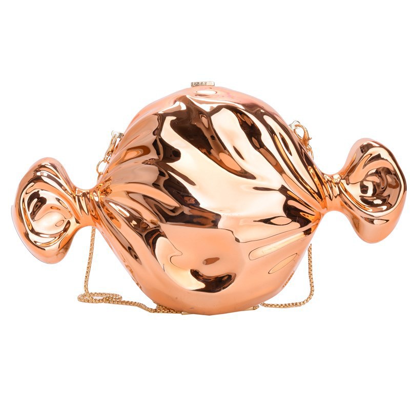 Bolsa de cena de lujo ligera transfronteriza cara brillante personalidad forma de caramelo bolso de mochila moda acrílico cadena bolso de noche mujer