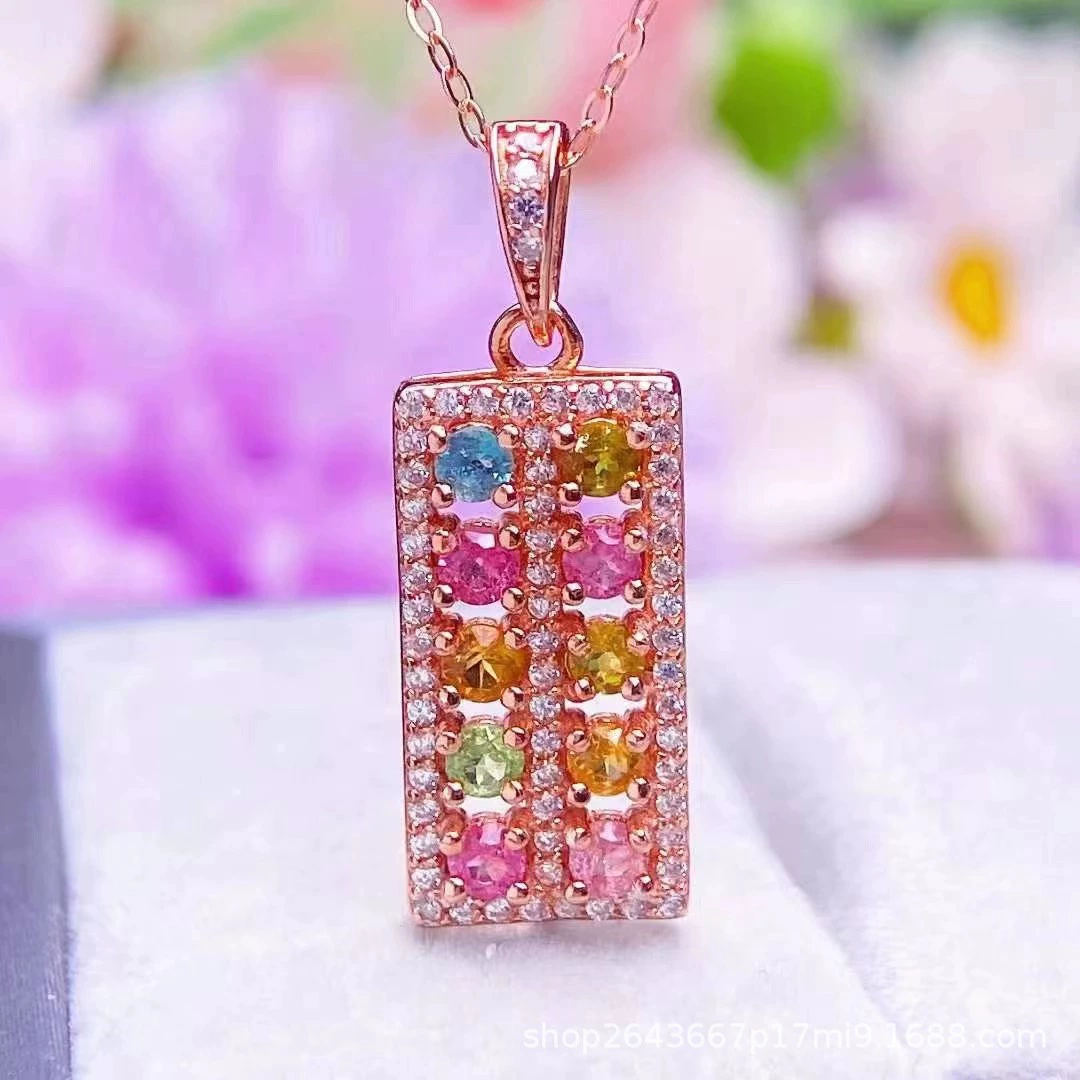 Organic tourmaline pendant, stone inlay, silver 925 sample, style