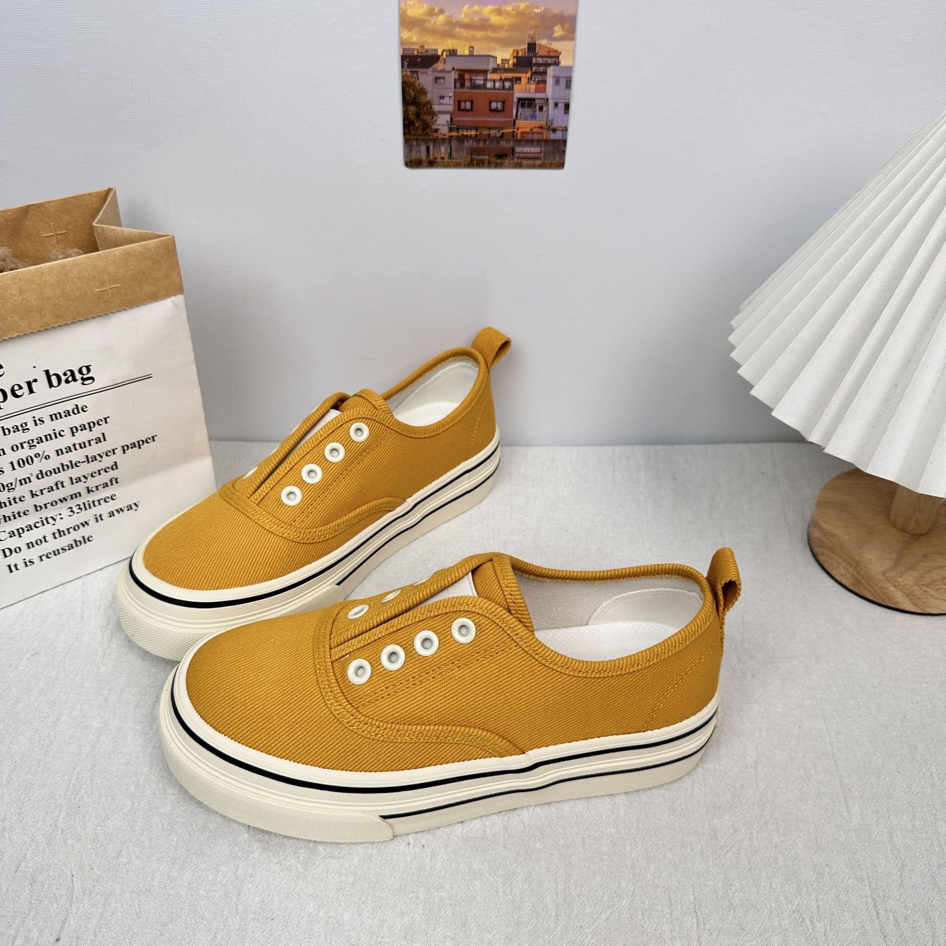6650 zapatos de lona de color sólido de estilo simple 2025 verano nuevo estilo de un pie zapatos casuales de suela gruesa de corte bajo