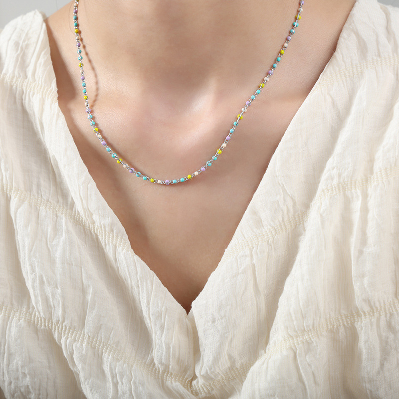 Luz de lujo personalidad nicho color eje colorido goteo collar de aceite de titanio acero todo fósforo de hadas temperamento pulsera joyería de moda para las mujeres