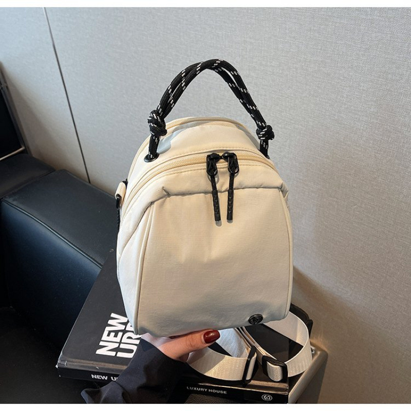 防水尼龙布包包女2025新款简约手提单肩通勤包轻便旅行背包斜挎包