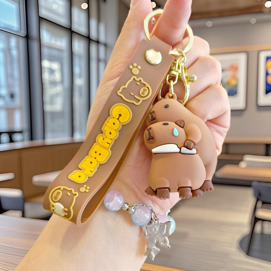 Nuevo llavero de Kapibala pareja mochila escolar colgante lindo capibara muñeca de PVC llavero de coche al por mayor