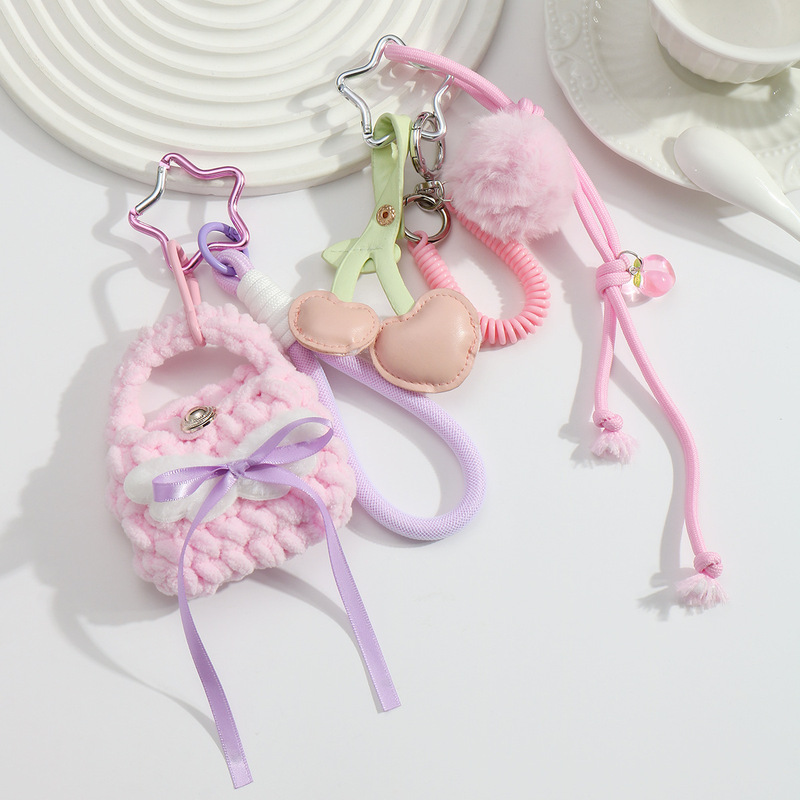 Cross-border new sweet girl hand-woven fur ball bluetooth storage bag carabiner bag pendant key chain