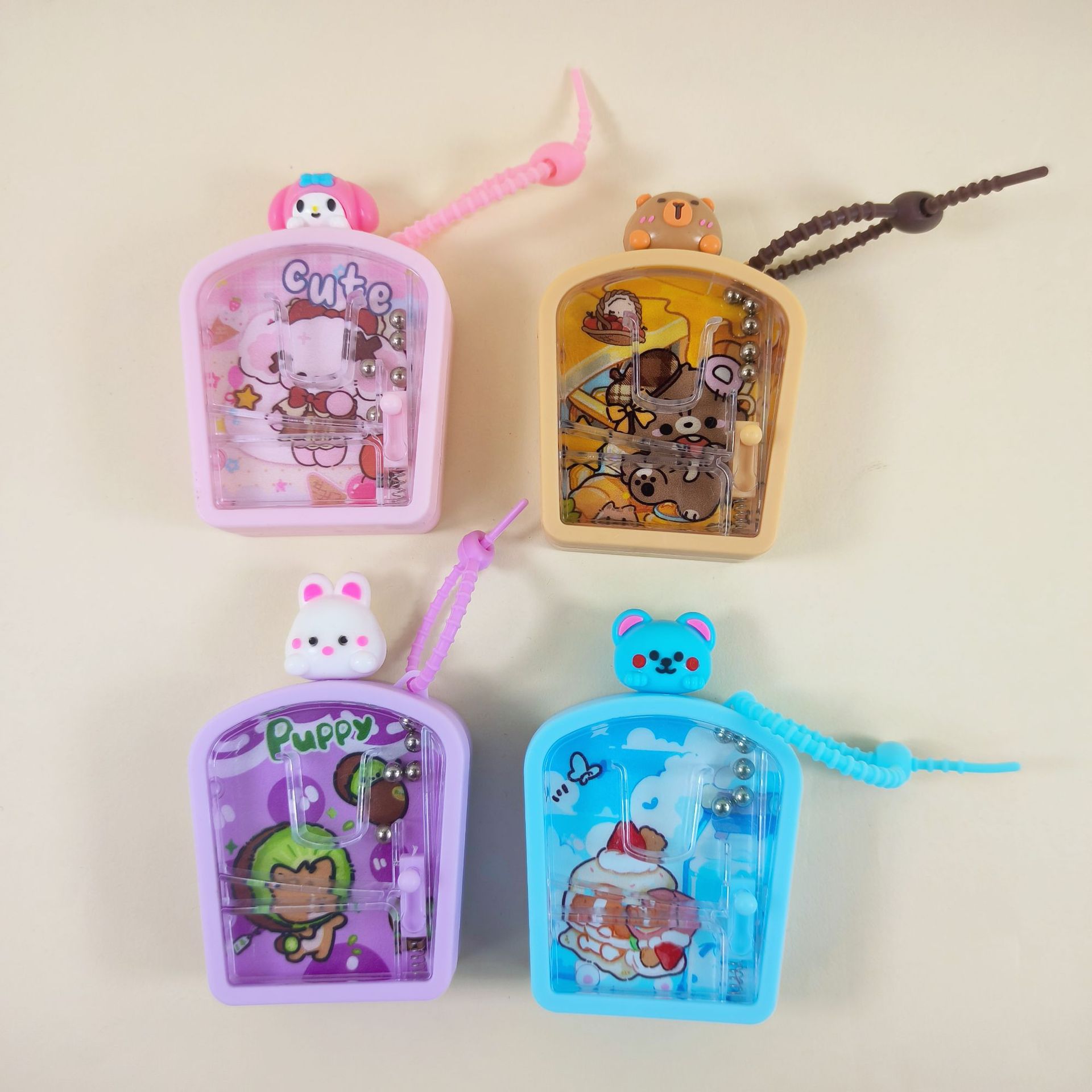 Juegos de dibujos animados divertidos máquina de martillo desprimir mochila colgante creativo pequeño regalo para estudiantes colgante llavero