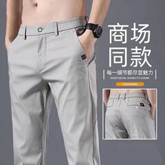 シャツの少ない服装の軽い贅沢なズボンの夏の薄いタイプの快適な弾力性のカジュアルなズボンの男性のビジネスの氷の糸の修身のストレートなズボン