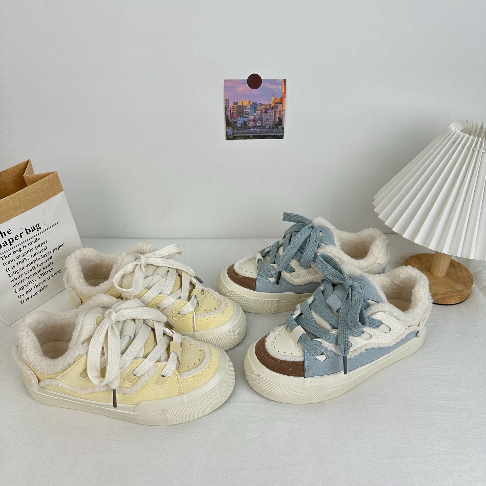 Invierno calentamiento skate para estudiantes de baja altura zapatos de algodón versátiles 2025 nuevo estilo coreano nicho zapatos de lona de lana