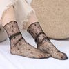 Factory explosion Korean version of lace fishing network Ge diamond -shaped mid -cylinder sexy hollow ladies pile net yarn socks wholesale