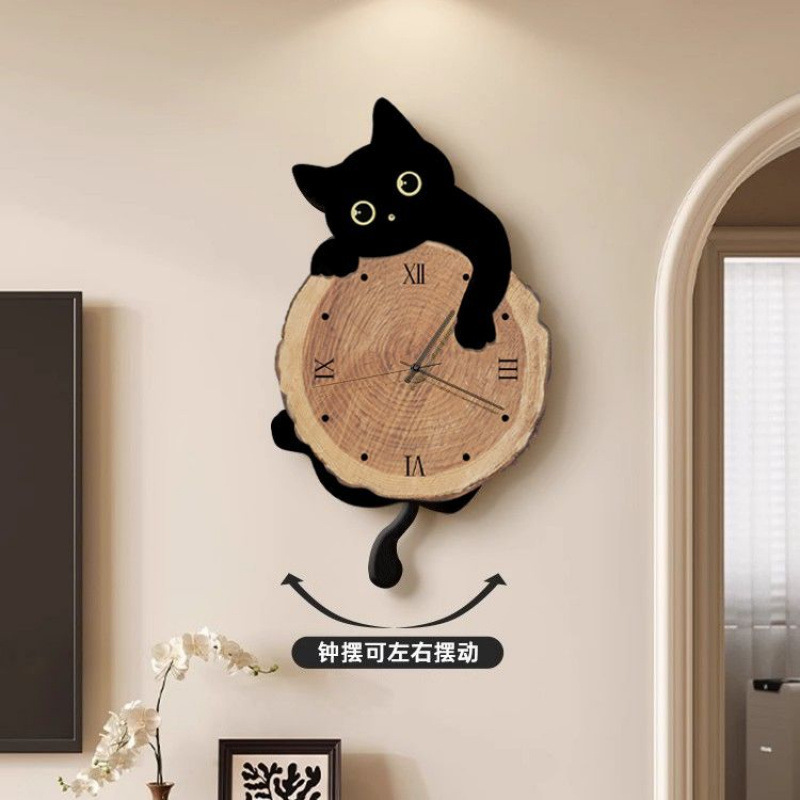 现代简约猫咪钟表挂钟客厅2025新款创意时钟挂墙感艺术挂表