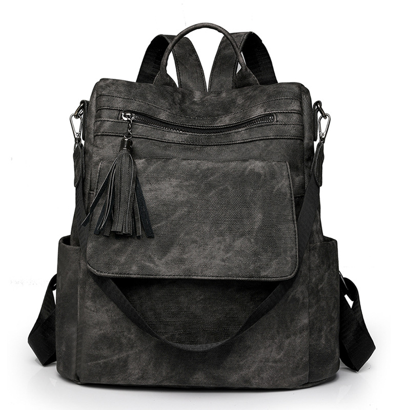 Nuevo estilo mochila mujer 2024 de gran capacidad retro moda borla bandolera viaje de ocio mochila ligera al por mayor