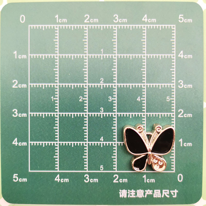 Temperamento de moda blanco y negro pequeño viento fragante cuatro hojas accesorios de plástico corazón de melocotón DIY pinzas de cabello material de ropa de correa