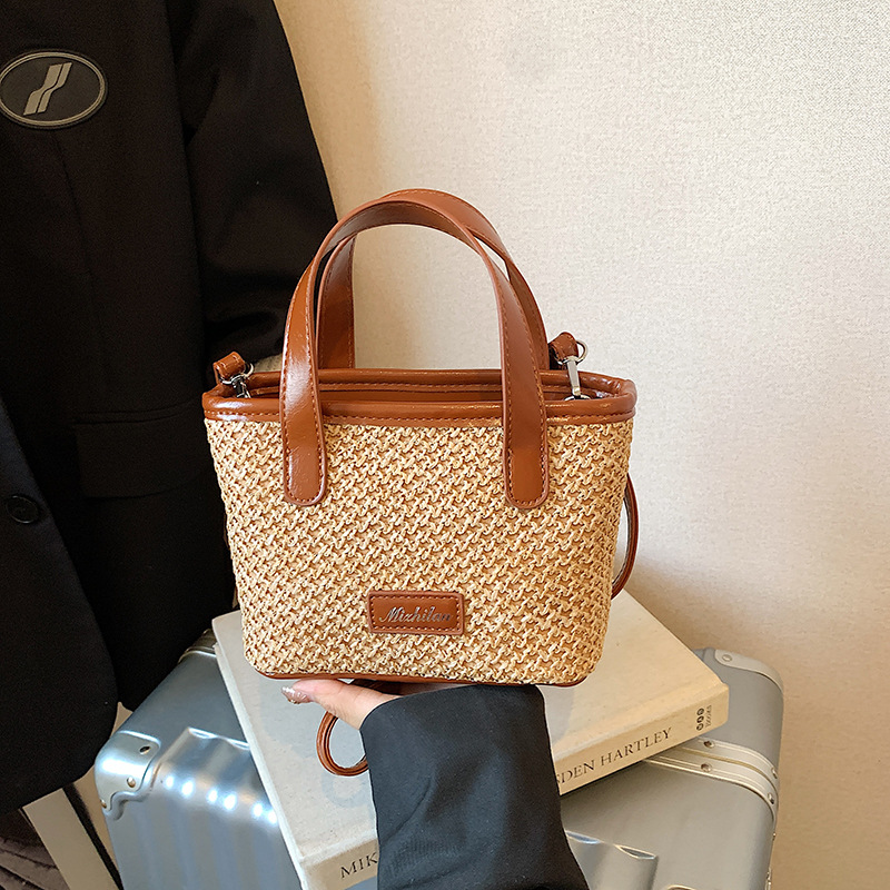 Bolsa de playa de moda coreana tejida, color extranjero, bolsa de hombro ligera y compacta para niños y niñas, nueva bolsa infantil transfronteriza.