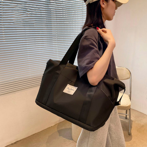 Large-capacity travel bag, women's lightweight portable boarding bag, students can put trolley suitcase, luggage bag storage bag