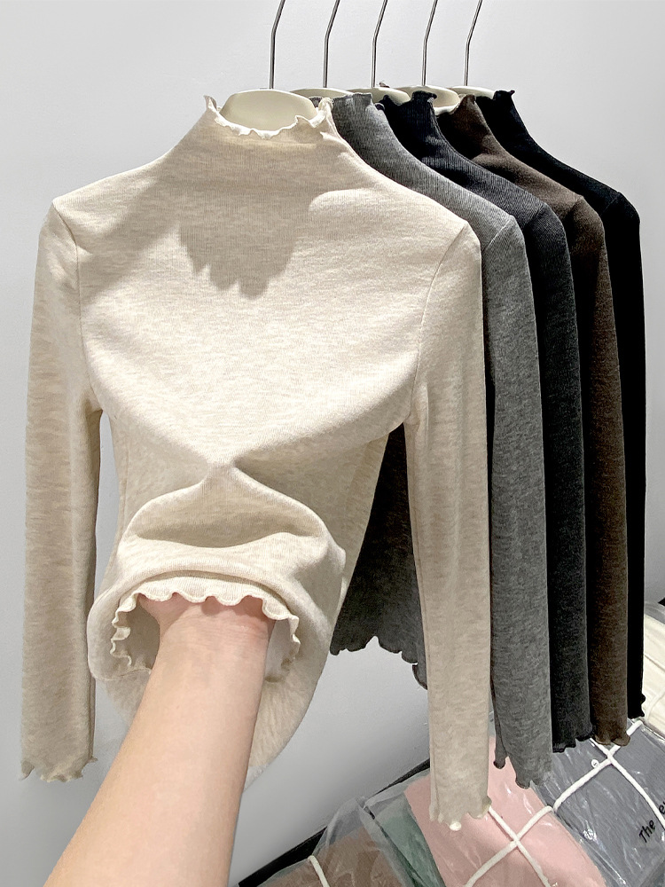 H360は厳選した木の耳元の半高襟の底のシャツの女性の秋冬の中で身を修めるレースのニットの上着を合わせます。