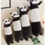 床上女生毛绒熊猫玩偶
