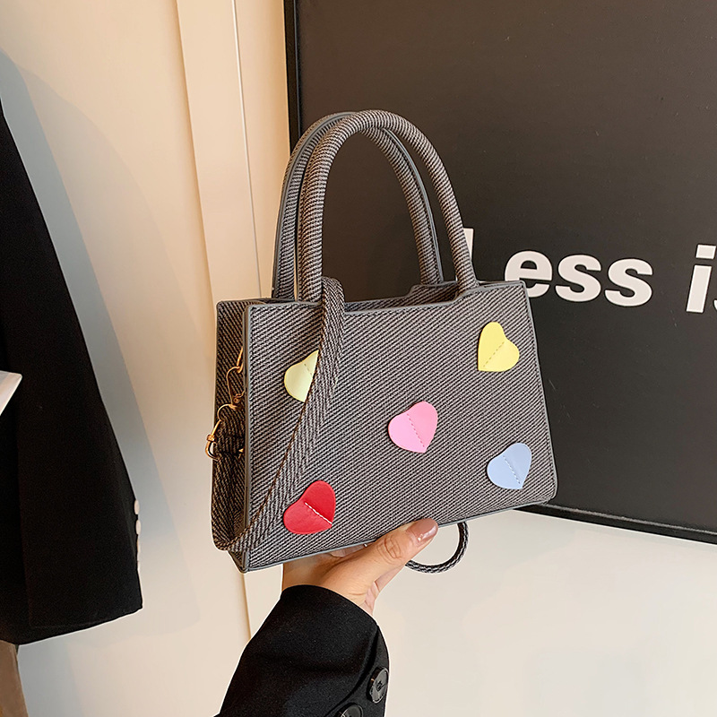 Este año, la popular explosión de bolsos para mujeres 2024 nueva moda versátil bolsos de mochila súper caliente bolsos portátiles de trabajo