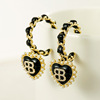 Black woven advanced earrings with letters heart shaped, high-quality style, light luxury style, European style