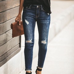 New European and American autumn and winter women's cross-border trousers ripped fashionable slim jeans trousers for women