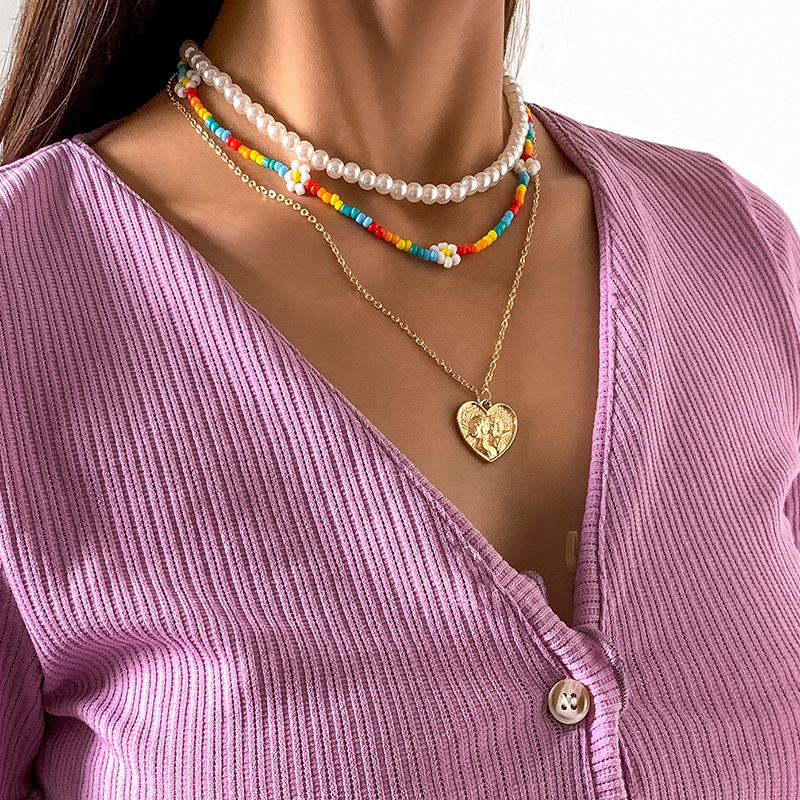 Wholesale Jewelry Heart Shape Pendant Colored Flowers Woven Imitation Pearl Necklace Set Nihaojewelry display picture 1