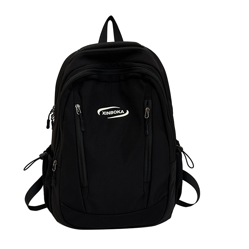 Fabricantes de mochilas escolares, estudiantes universitarias al por mayor, simples y versátiles, versión coreana de mochilas de ocio de nicho engrosadas