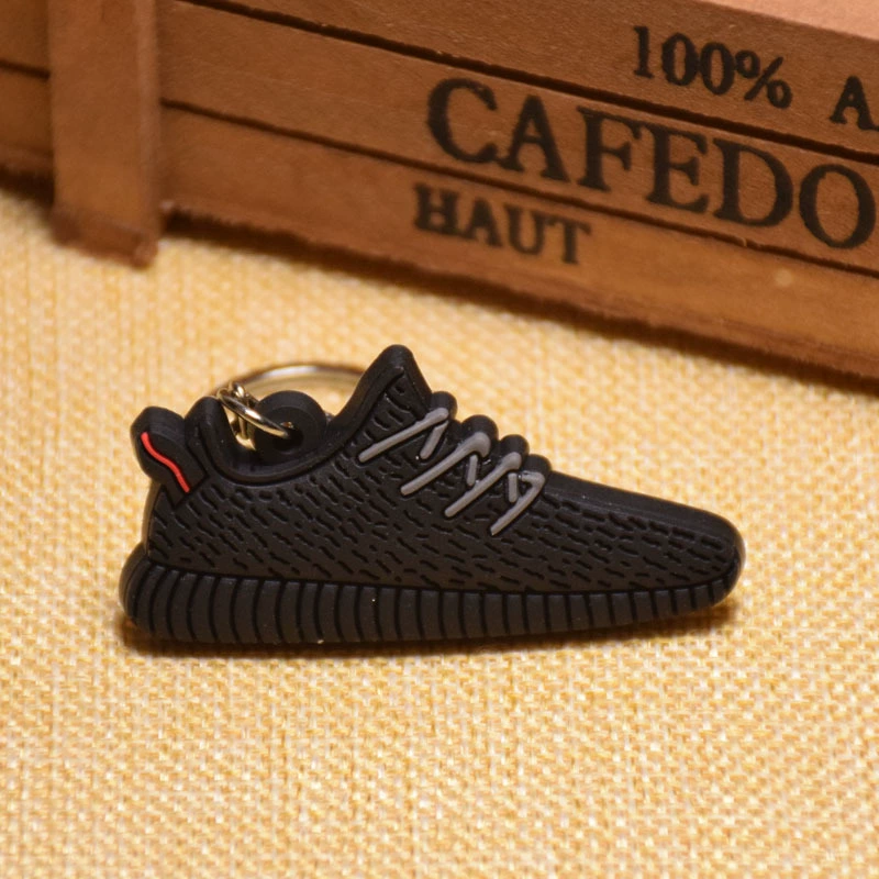 Keychain Adi 3D sneaker, soft PVC mini shoe charm, 8 × 4 × 2 cm, lightweight
