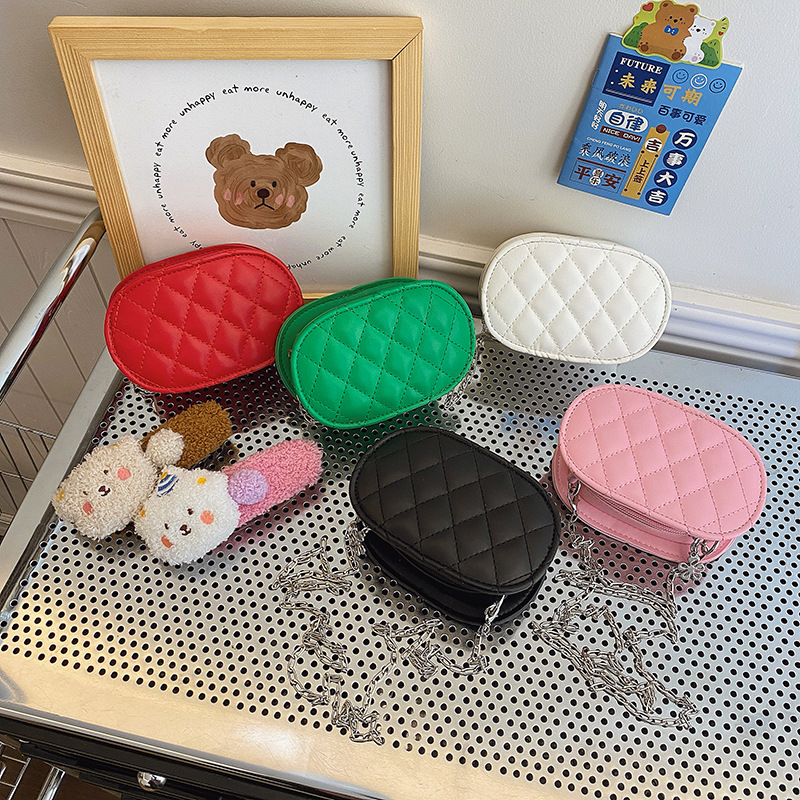 Cadena de moda, bolsos de hombro para niños y niñas, bolsos de mensajero para bebés con bordado de rombos de estilo occidental, bolsos de niños ovalados de color sólido
