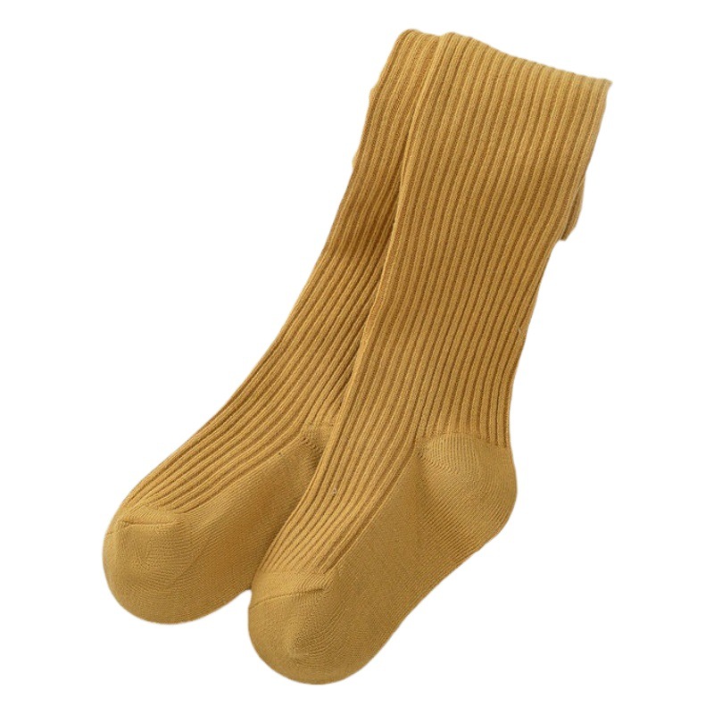 Nuevo color sólido rayas verticales polainas de las muchachas del otoño y el invierno estilo coreano ocasional los niños ropa exterior pantimedias blancas en stock