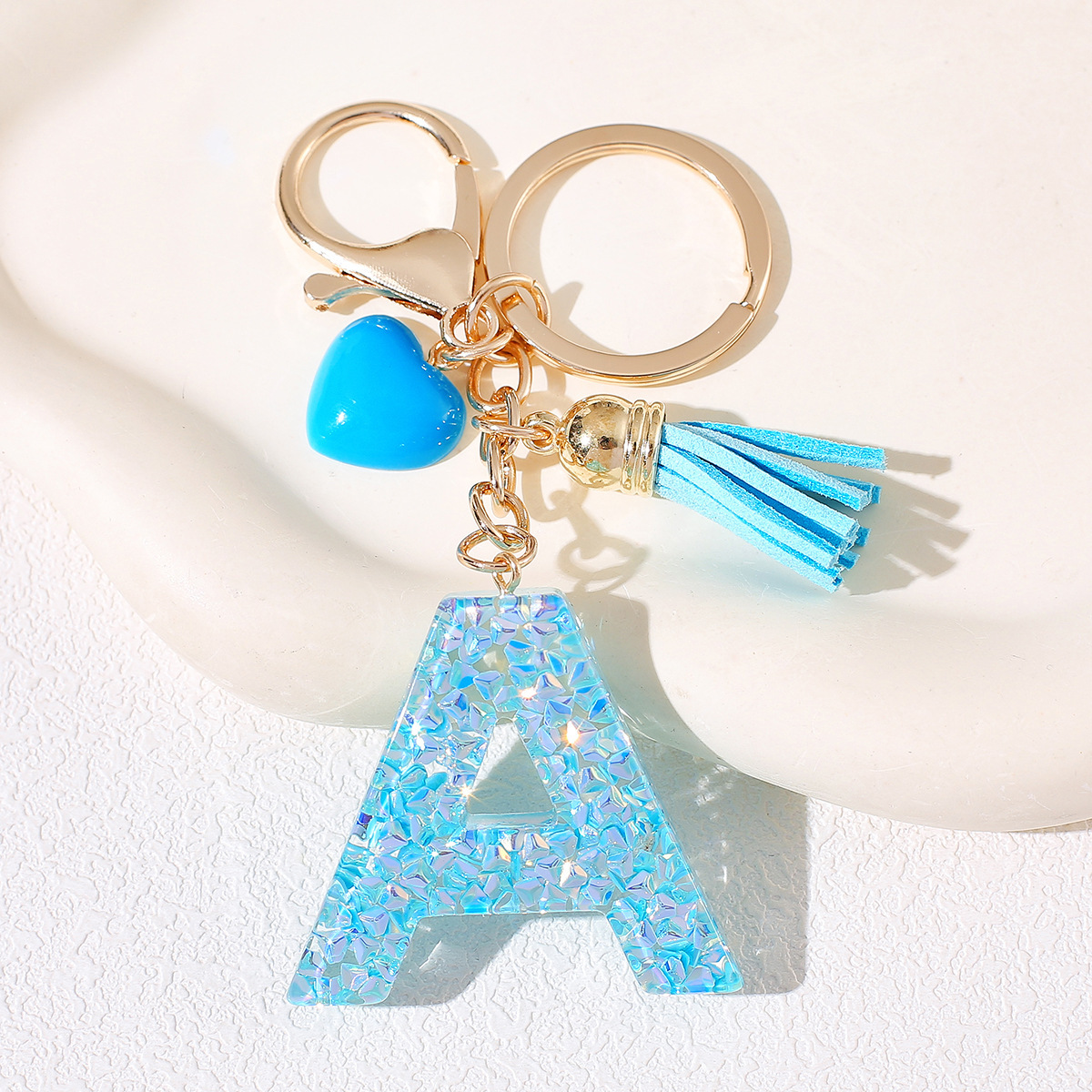 Nuevos productos azules de amor con frascos de letras lindos enclavadores decoraciones europeas y americanas populares llaveros damas