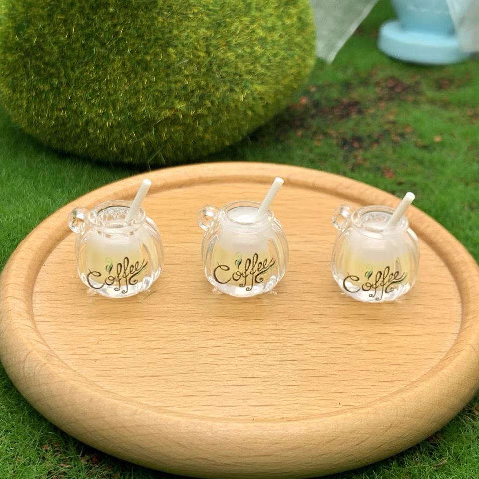 Suministro directo de fábrica de dos colores taza de café luminosa DIY accesorios para el cabello llavero mochila colgante material al por mayor diadema hecha a mano